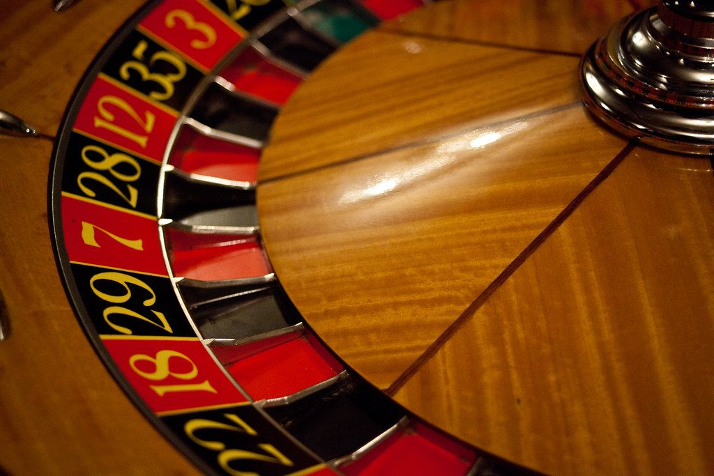 A roulette wheel with red and black pockets